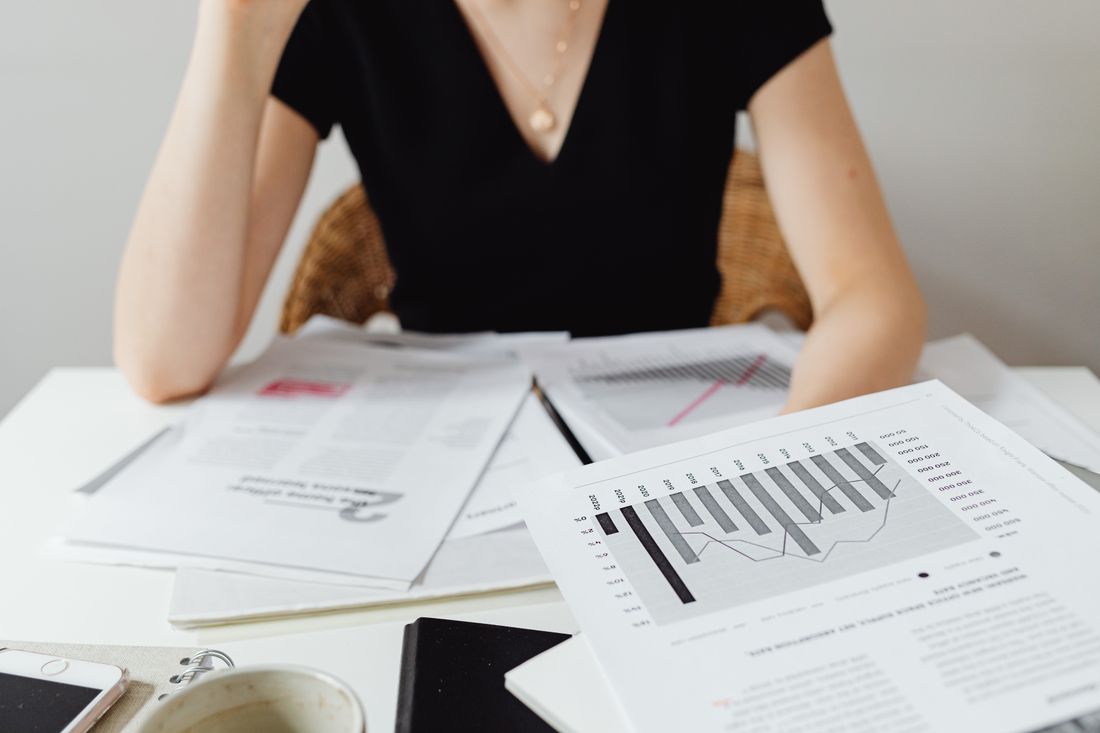 First-time buyer reading a survey report with a surveyor