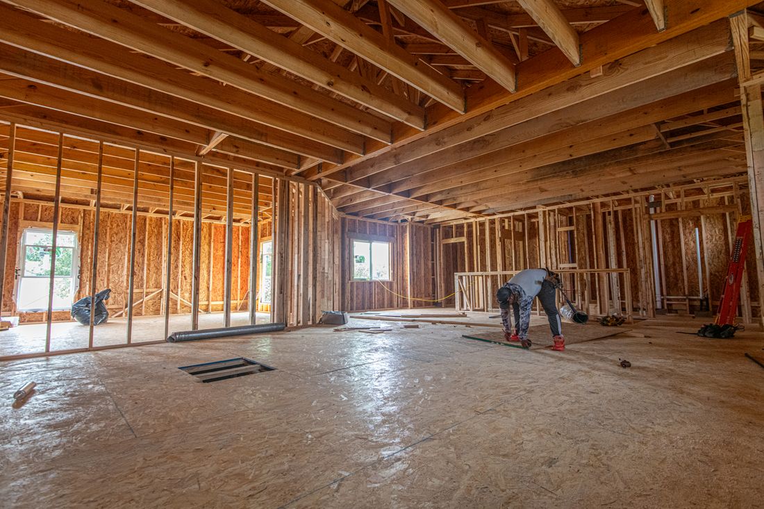 Surveyor carrying out a new-build snagging inspection
